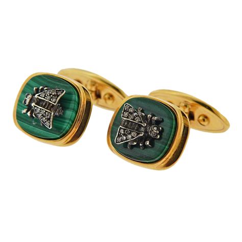 gold gucci cufflinks